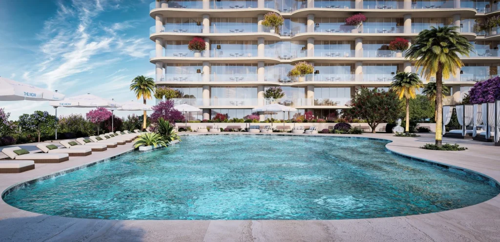 La Grand Pool du projet The Wow par Mr. Eight à Dubaï, piscine style resort au pied de la tour